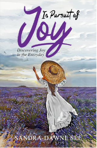 Original In Pursuit of Joy cover showing a person wearing a sunhat in a field of purple flowers